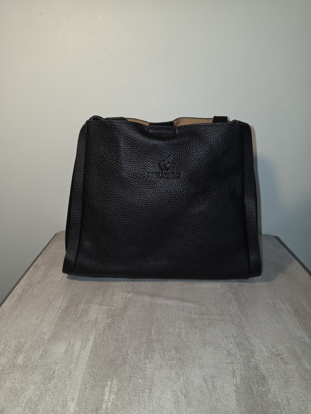 Pebbled Black Crossbody Bag with Embossed Logo